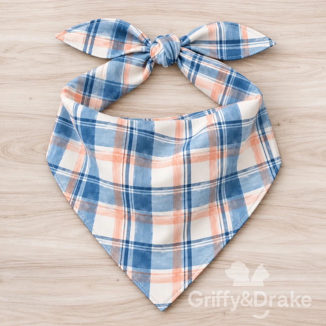 Blueberry Blossoms pet bandana in light blue, deeper blue, peach, and cream plaid.