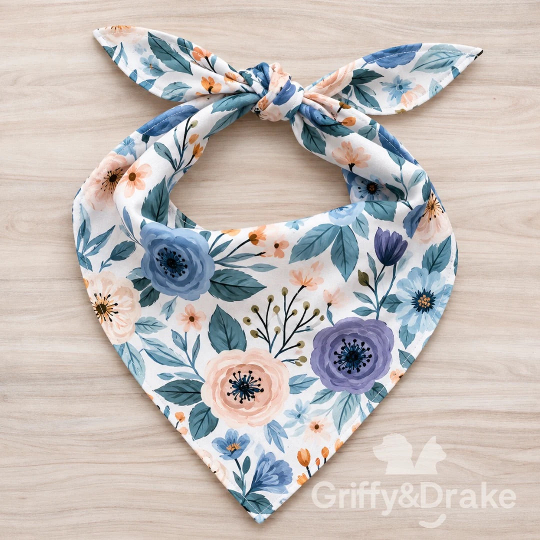 Blueberry Blossoms pet bandana with blue and peach flowers and blue-green leaves on a light background.